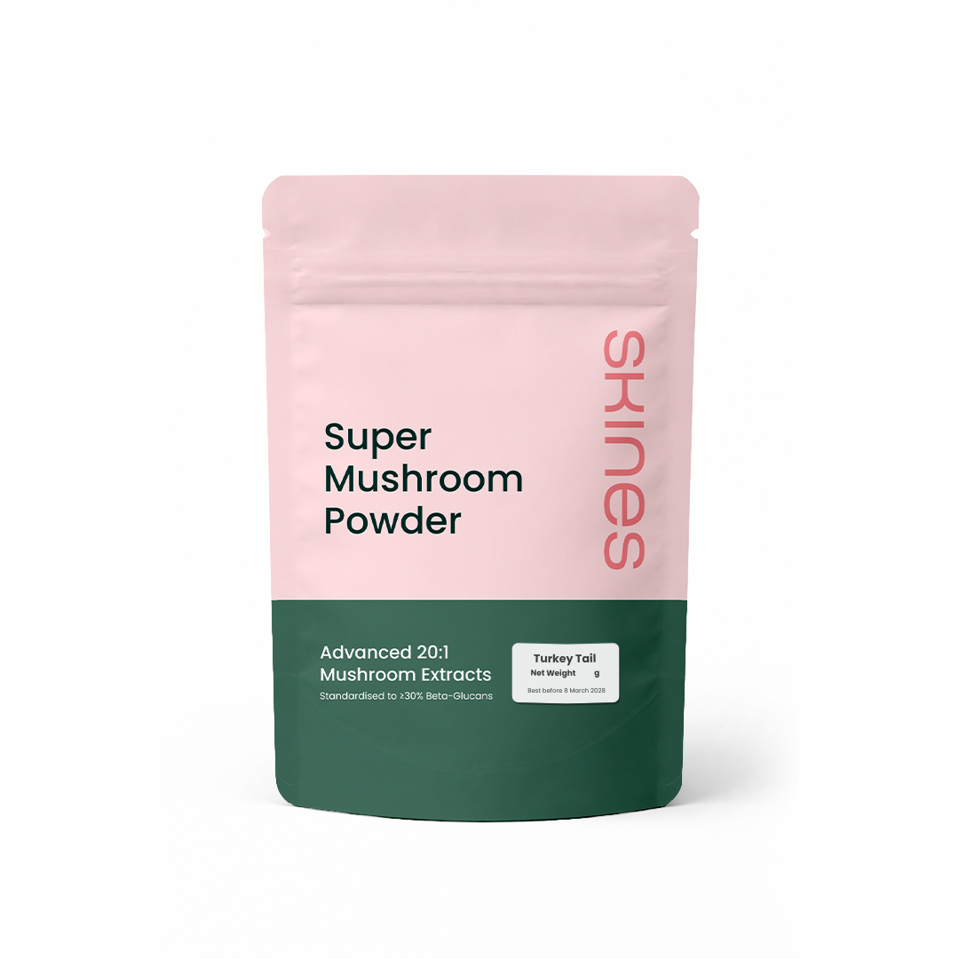 Turkey Tail Super Mushroom Powder package with pink and green design on a white background